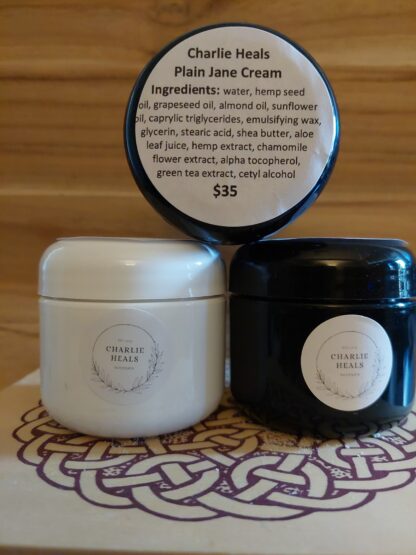 Three jars of Plain Jane Pain Cream showing the CH logo and ingredients.